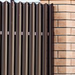 Металлические Стражи Вашего Уюта: От Штакетника до Монументальных Ограждений